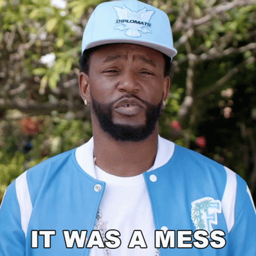 Man with Beard in Blue Jacket and Diplomats Hat