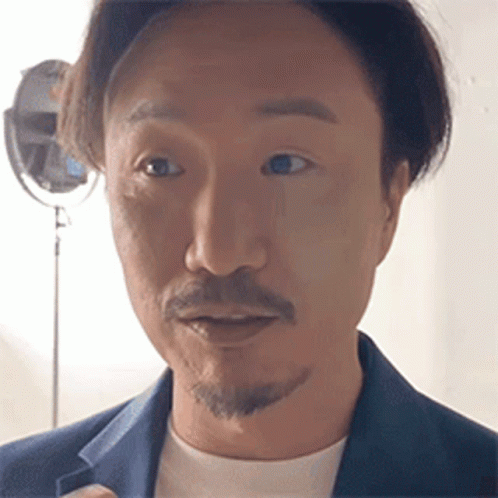 Man With Beard In Blue Jacket And White T-Shirt GIF