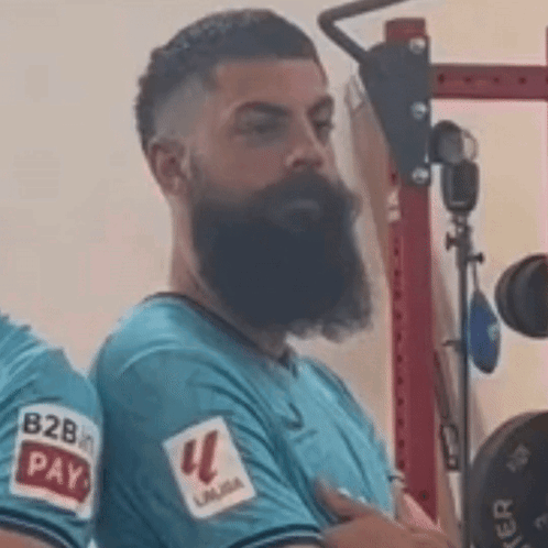 Man With Beard In Blue Shirt And Pay Sticker GIF
