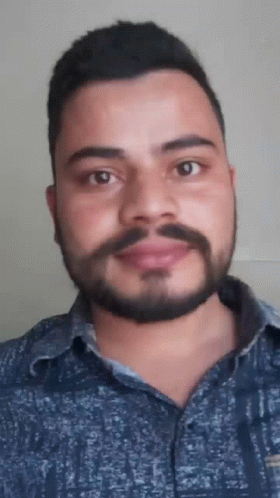 Man with Beard in Blue Shirt