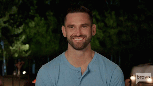 Man With Beard in Blue Shirt Saying Bravo