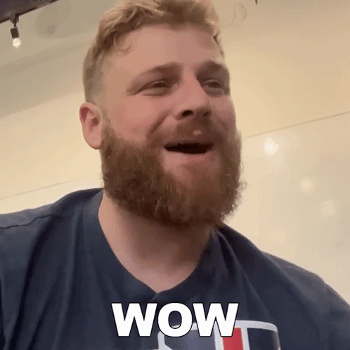 Man With Beard In Blue Shirt Saying Wow GIF
