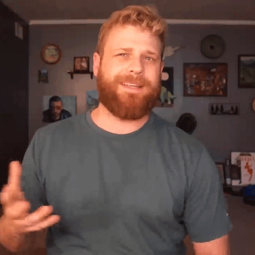 Man With Beard In Blue Shirt Smiling GIF