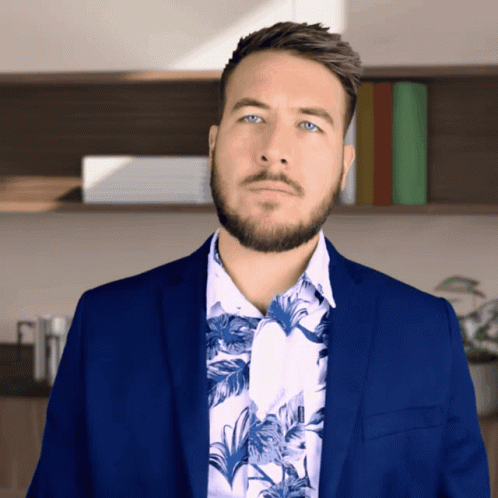 Man With Beard in Blue Suit and Blue Shirt