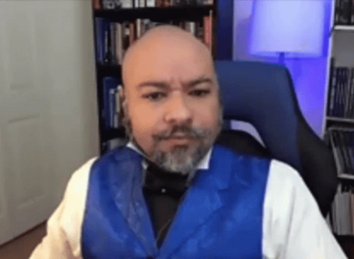 Man With Beard In Blue Vest And Bow Tie GIF