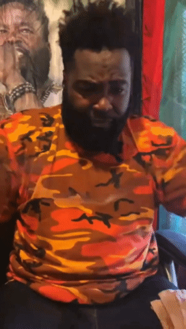 Man with Beard in Camouflage Shirt