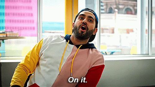 Man With Beard In Colorful Hoodie And Hat GIF