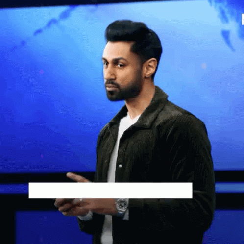 Man With Beard In Front Of Blue Screen GIF