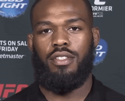 Man with Beard in Front of Bud Light Sign