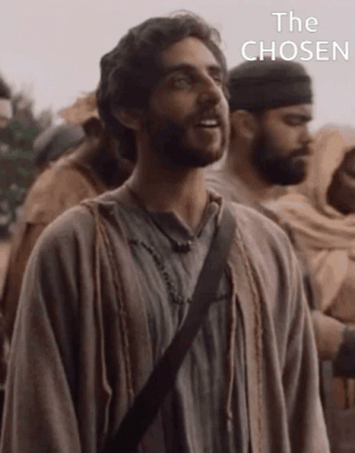 Man With Beard in Front of Crowd With The Chosen