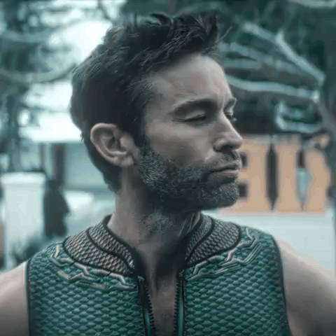 Man With Beard In Green Vest GIF