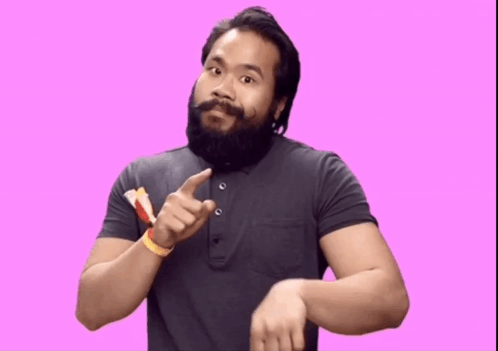 Man with Beard in Grey Shirt