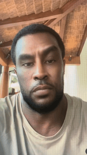 Man With Beard In Grey Shirt GIF