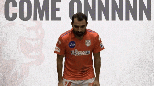 Man With Beard in Orange Jersey Saying Jio