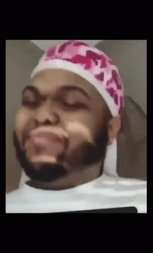 Man With Beard In Pink Hat Making Face GIF
