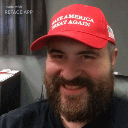 Man With Beard in Red Hat Make America Great Again