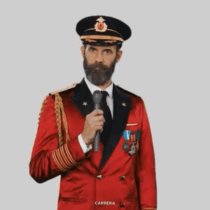 Man with Beard in Red Military Uniform and Black Hat