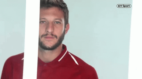 Man With Beard in Red Shirt BT Sport Logo