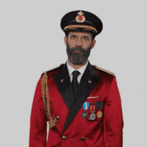Man With Beard In Red Suit And Black Hat GIF