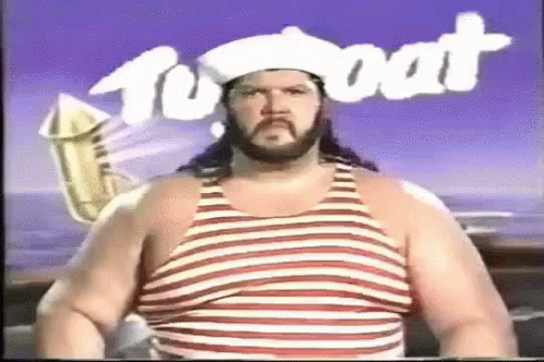 Man with Beard in Striped Tank Top