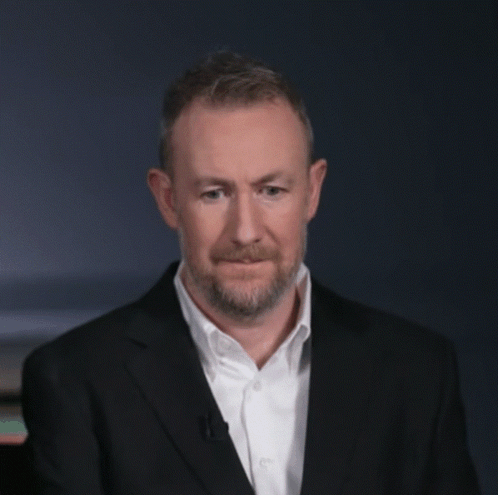 Man with Beard in Suit and White Shirt