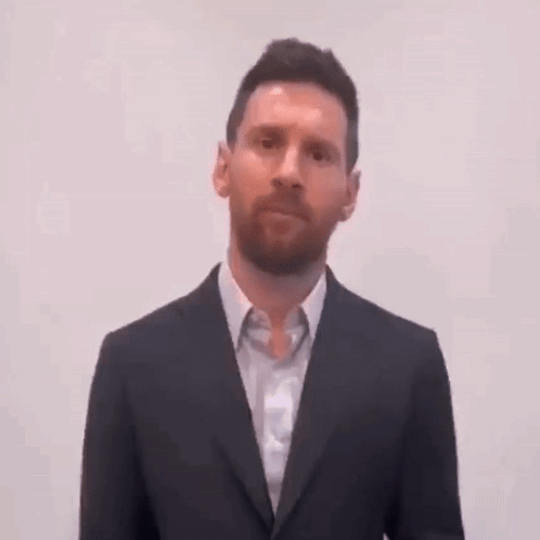 Man With Beard in Suit Making Funny Face