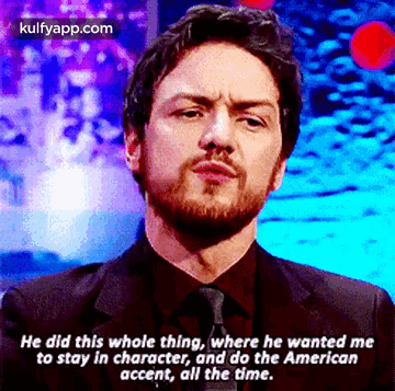 Man With Beard in Suit Says Stay in Character