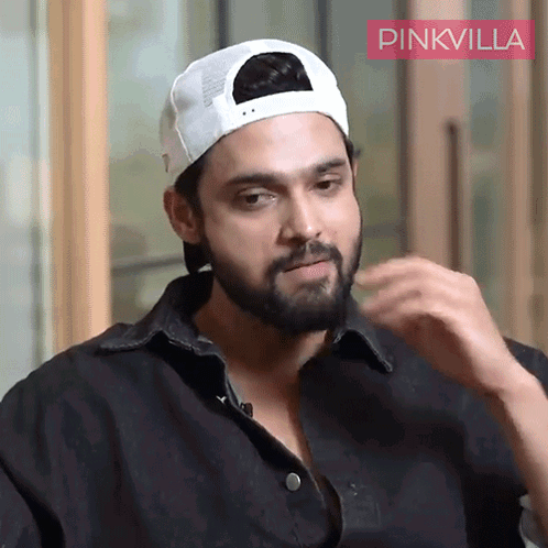 Man With Beard in White Baseball Cap Saying Pinkvilla
