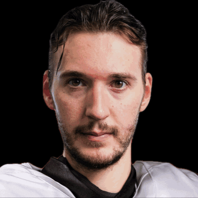 Man With Beard in White Jersey and Black Shirt