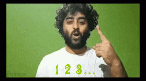 Man with Beard in White Shirt Saying 123