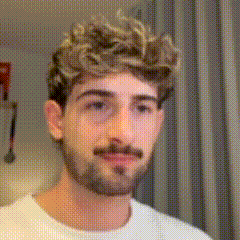 Man with Beard in White Shirt