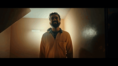 Man with Beard in Yellow Shirt
