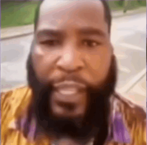 Man With Beard In Yellow Shirt GIF