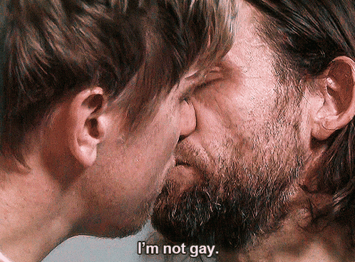 Man With Beard Kissing Man Saying Not Gay GIF