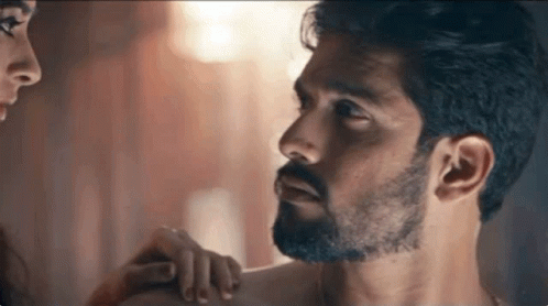 Man With Beard Looking At Woman Touching Shoulder GIF