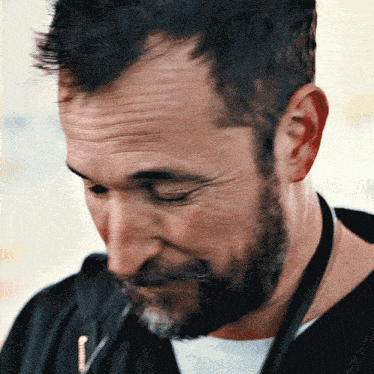 Man with Beard Looking Down