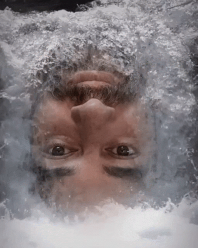 Man With Beard Looking Up In Water GIF