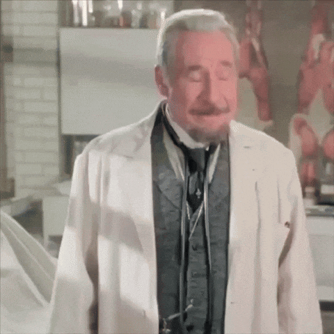 Man With Beard, Mustache, White Coat, Tie GIF