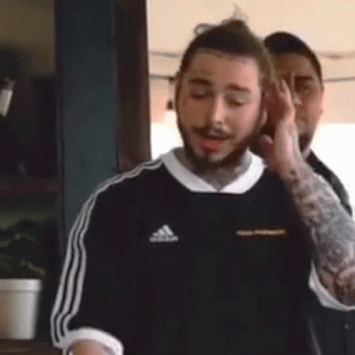 Man With Beard Next to Another Man in Kitchen