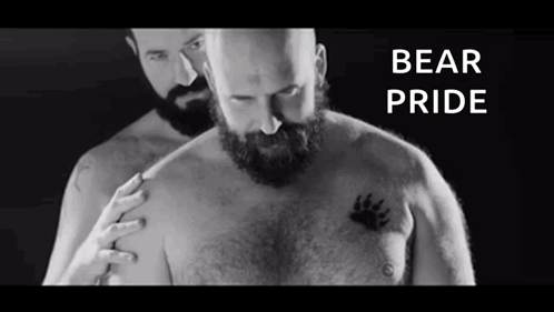 Man with Beard Next to Man with Bear Paw Tattoo