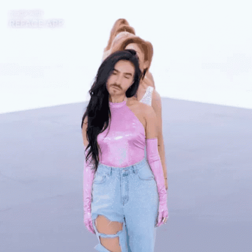 Man with Beard Next to Woman in Pink