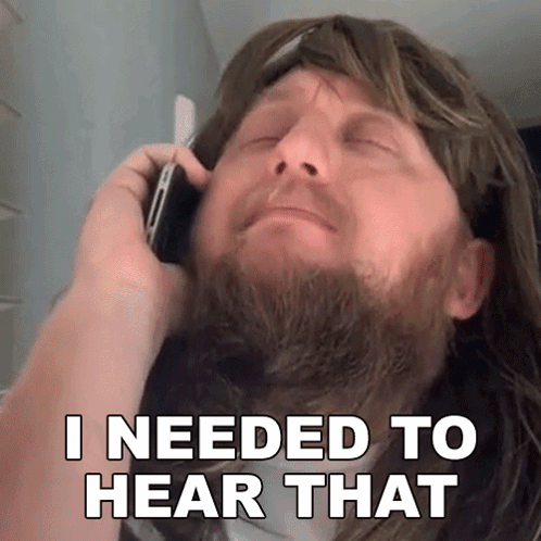 Man With Beard on Phone Saying I Needed to Hear That