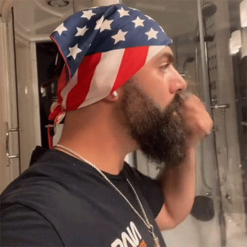 Man With Beard Playing Guitar In A Band With Drummer GIF