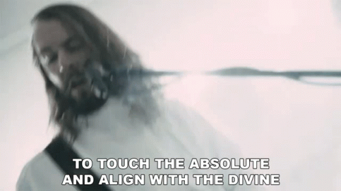 Man With Beard Playing Guitar To Touch Absolute And Align Divine