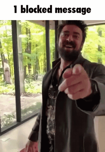 Man with Beard Pointing at Camera 1 Blocked Message