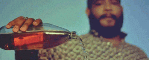 Man With Beard Pouring Soda GIF