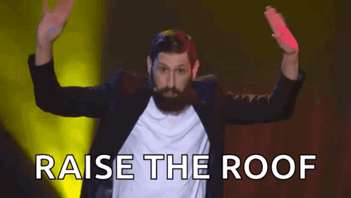 Man with Beard Raising Hands Raise Roof