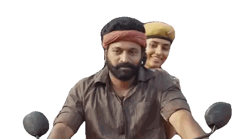 Man with Beard Riding Motorcycle