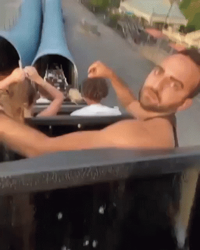Man with Beard Riding Roller Coaster