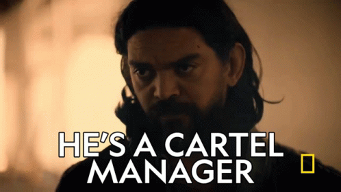 Man With Beard Saying He's a Cartel Manager